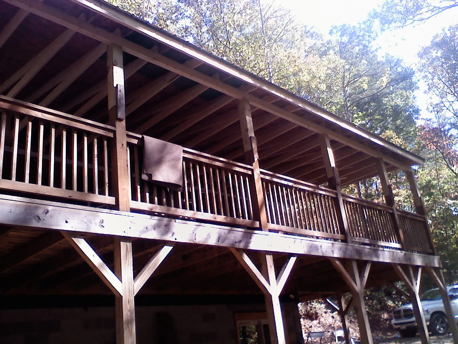 Timber framing under a new elevated porch and deck — Roof Leak Repair in Lake Hill by Roofing Brothers
